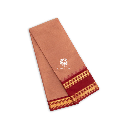 Peach handwoven Kanchi cotton saree with a brick red and gold zari temple border, folded