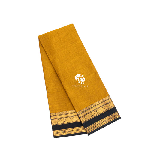 Mustard yellow handwoven Kanchi cotton saree with a black and gold zari peacock border, folded