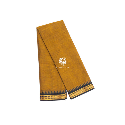 Mustard Kanchi cotton saree folded, showing the black zari temple border with gold diamonds — Ayraa Nithya by Ayraa Silks