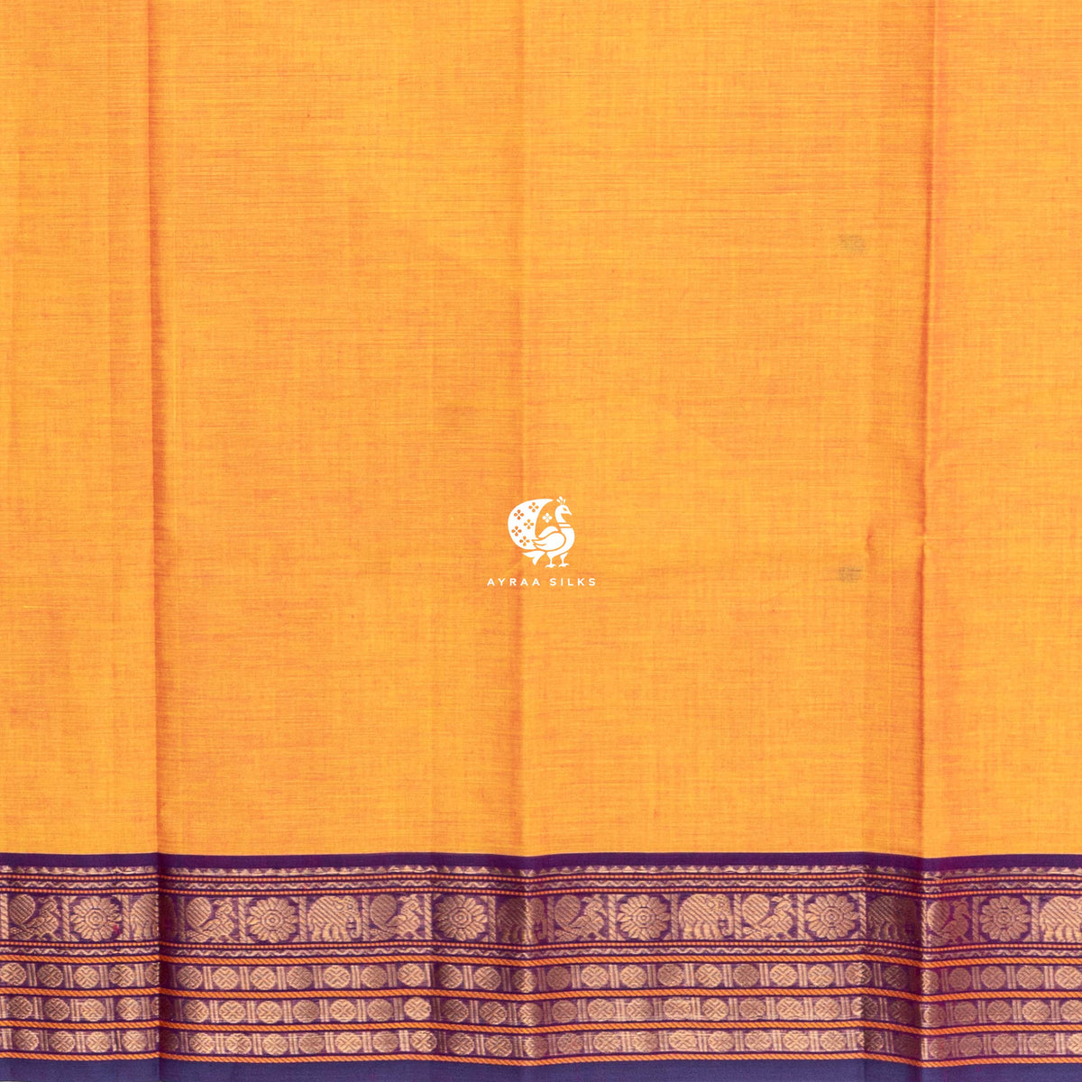 Plain mustard cotton running blouse meeting the purple and gold zari border