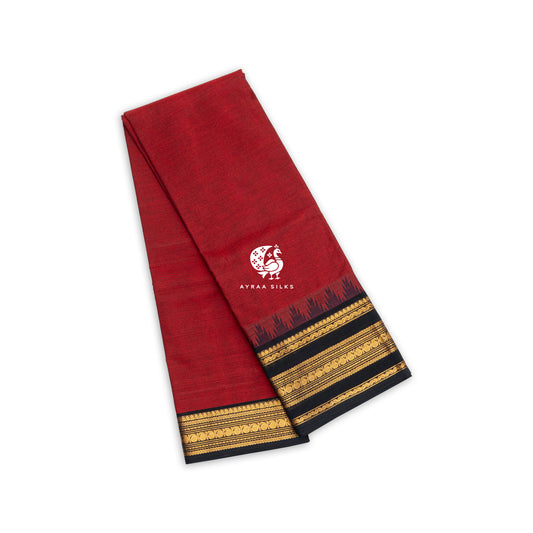Red handwoven Kanchi cotton saree with black and gold zari temple border, folded