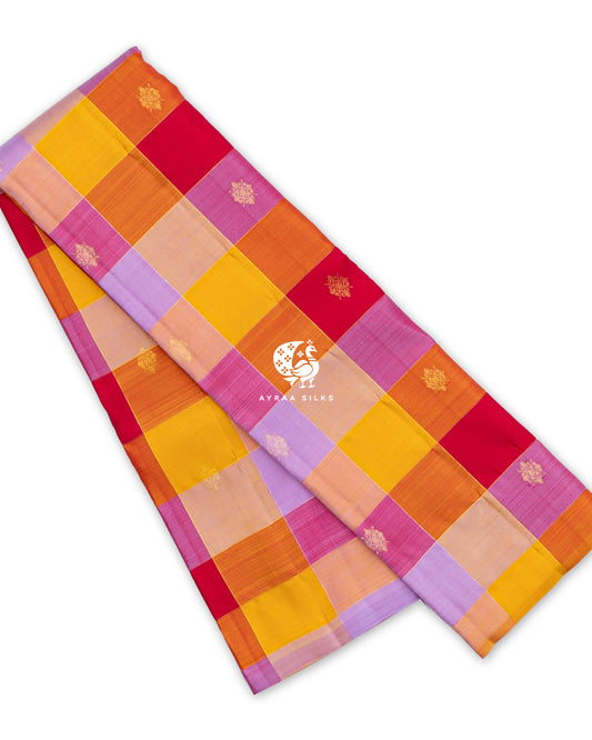 Multicolour pure Kanchipuram silk saree folded, with large Kattam (checks) in yellow, orange, red, pink and lilac