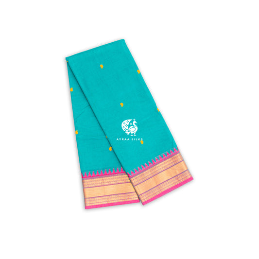 Teal green Kanchi cotton saree folded, showing the pink zari temple border and yellow thread buttas — Ayraa Nithya by Ayraa Silks