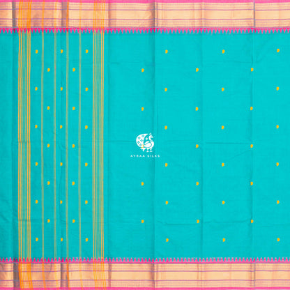 Teal green Kanchi cotton saree laid flat, pallu with stripes and pink temple borders on both sides
