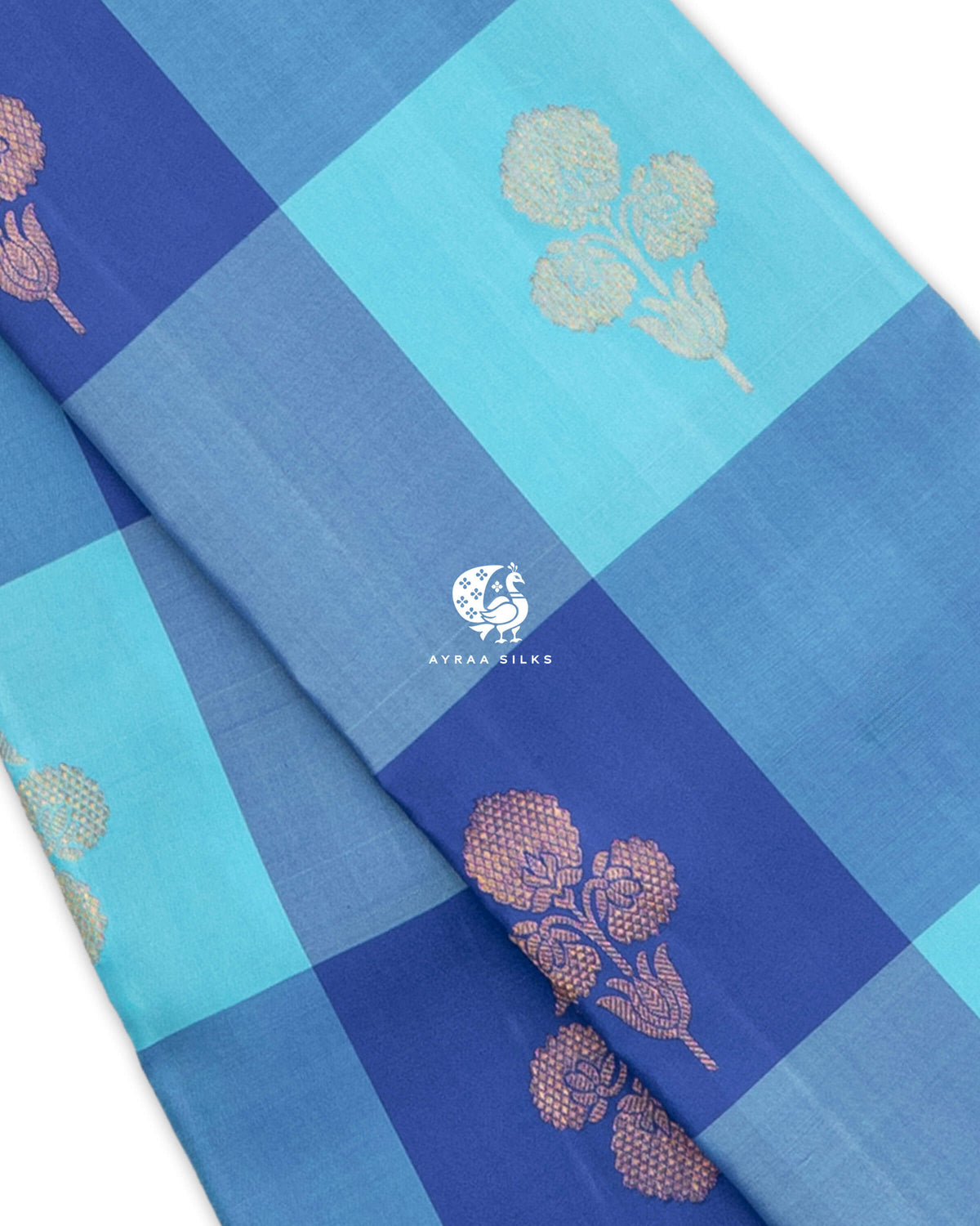 Close view of the Kattam (checks) with floral bouquet zari buttas on blue pure Kanchipuram silk