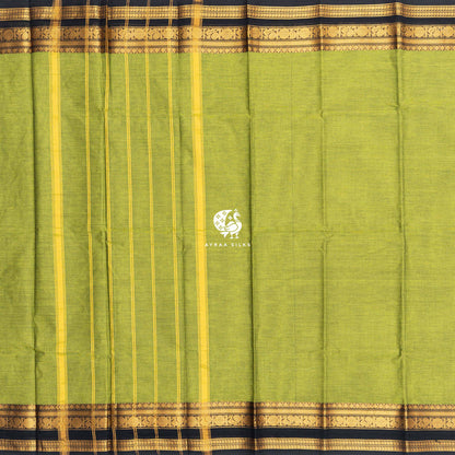 Mehendi green Kanchi cotton saree laid flat, pallu with stripes and black zari borders on both sides