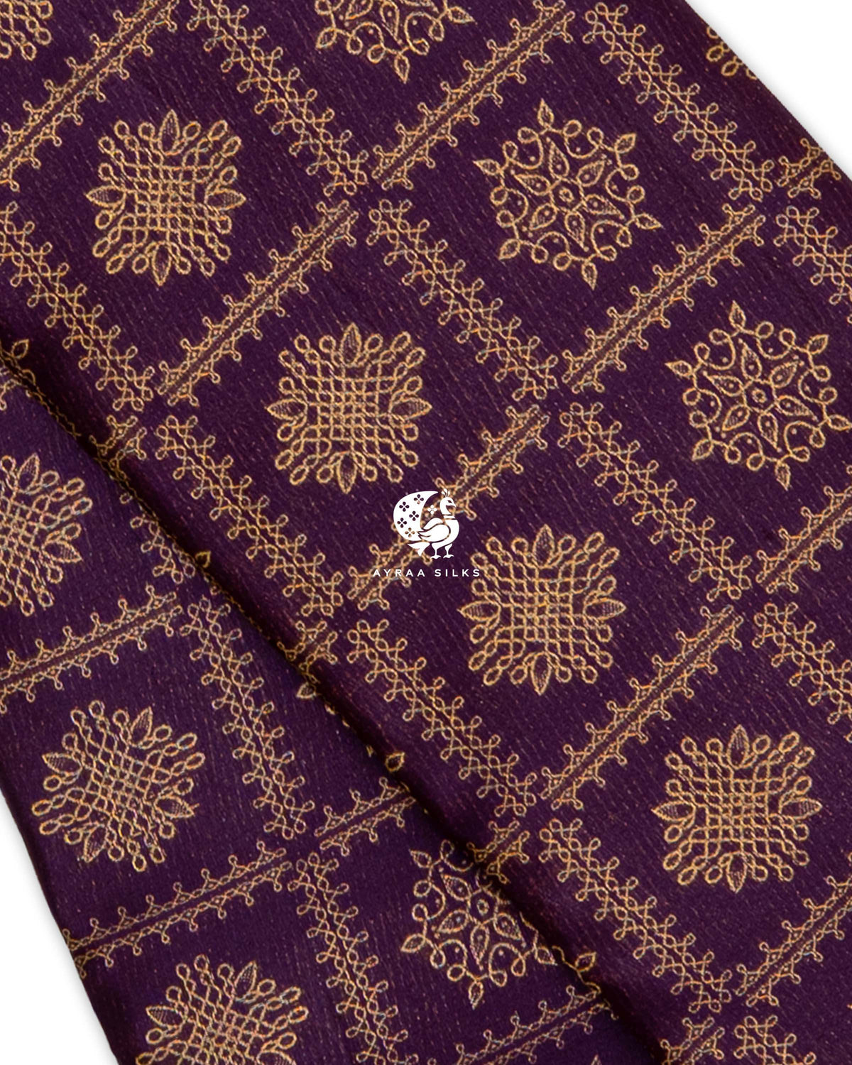 Close view of zari kolam motifs set in a zari Kattam (checks) grid on jamun purple pure Kanchipuram silk