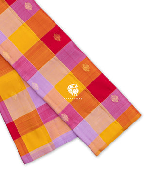 Multicolour Kattam Kolam Kanchipuram silk saree folded, showing the borderless edge with large checks and kolam zari buttas