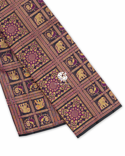 Black Yanai Mayil Brocade Kanchipuram silk saree folded, showing the fine black edge and zari checks with elephant and peacock motifs