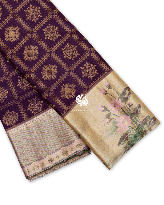 Jamun purple Kanchipuram pattu saree showing its two borders, a gold zari tissue lotus border and a pastel floral zari border