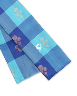 Blue Kattam Floral Butta Kanchipuram silk saree folded, showing the checked body edge with floral zari buttas