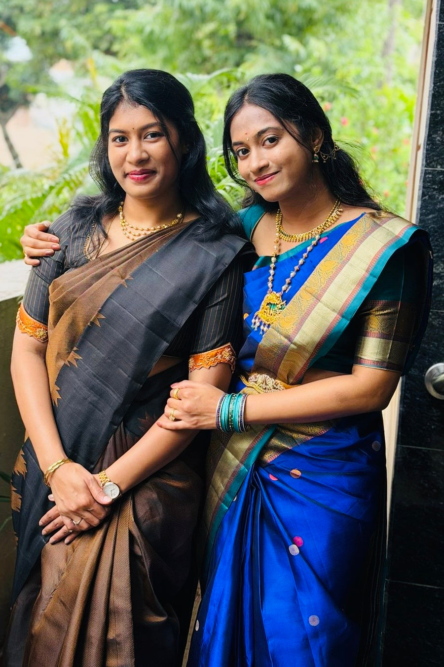 Woman wearing an Ayraa Silks saree