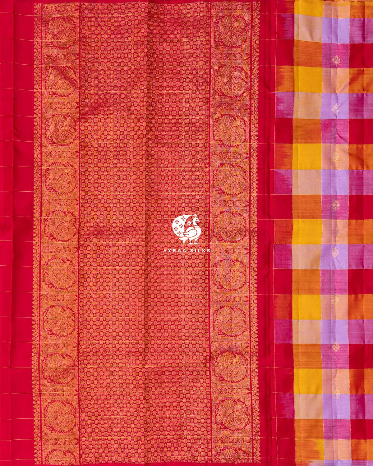 Contrast red zari pallu with Mayil Chakra (peacock medallion) side borders beside the multicolour checked body