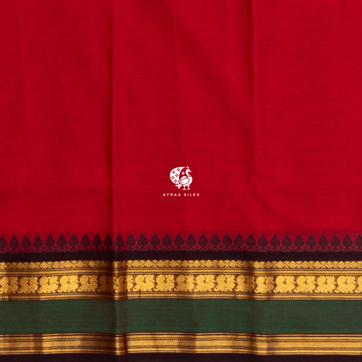 Running blouse of the red Kanchi cotton saree, same body colour with the black temple and gold zari border
