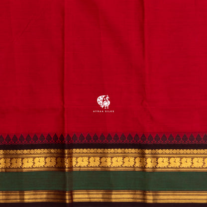 Running blouse of the red Kanchi cotton saree, same body colour with the black temple and gold zari border
