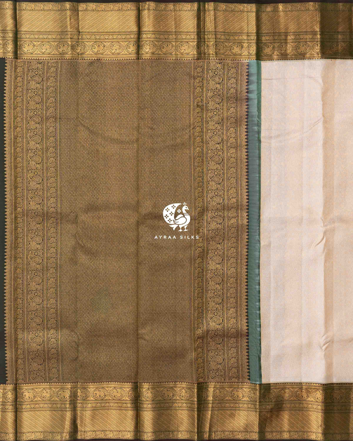 Antique gold zari pallu in diamond weave with Mayil (peacock) side borders beside the cream zari brocade body