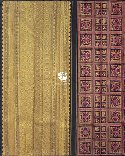 Rich gold zari pallu in chevron weave with temple edges beside the black and purple brocade body