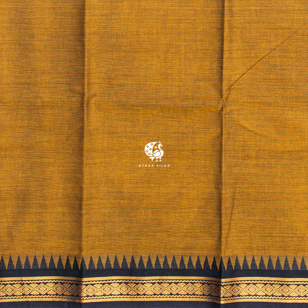 Mustard handwoven cotton body with the black and gold zari border along the edge