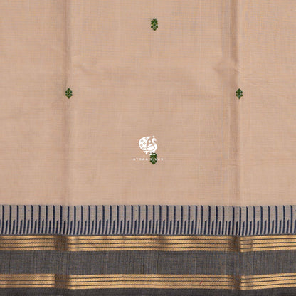 Running blouse in the same beige as the body, with the same zari border and blue thread band