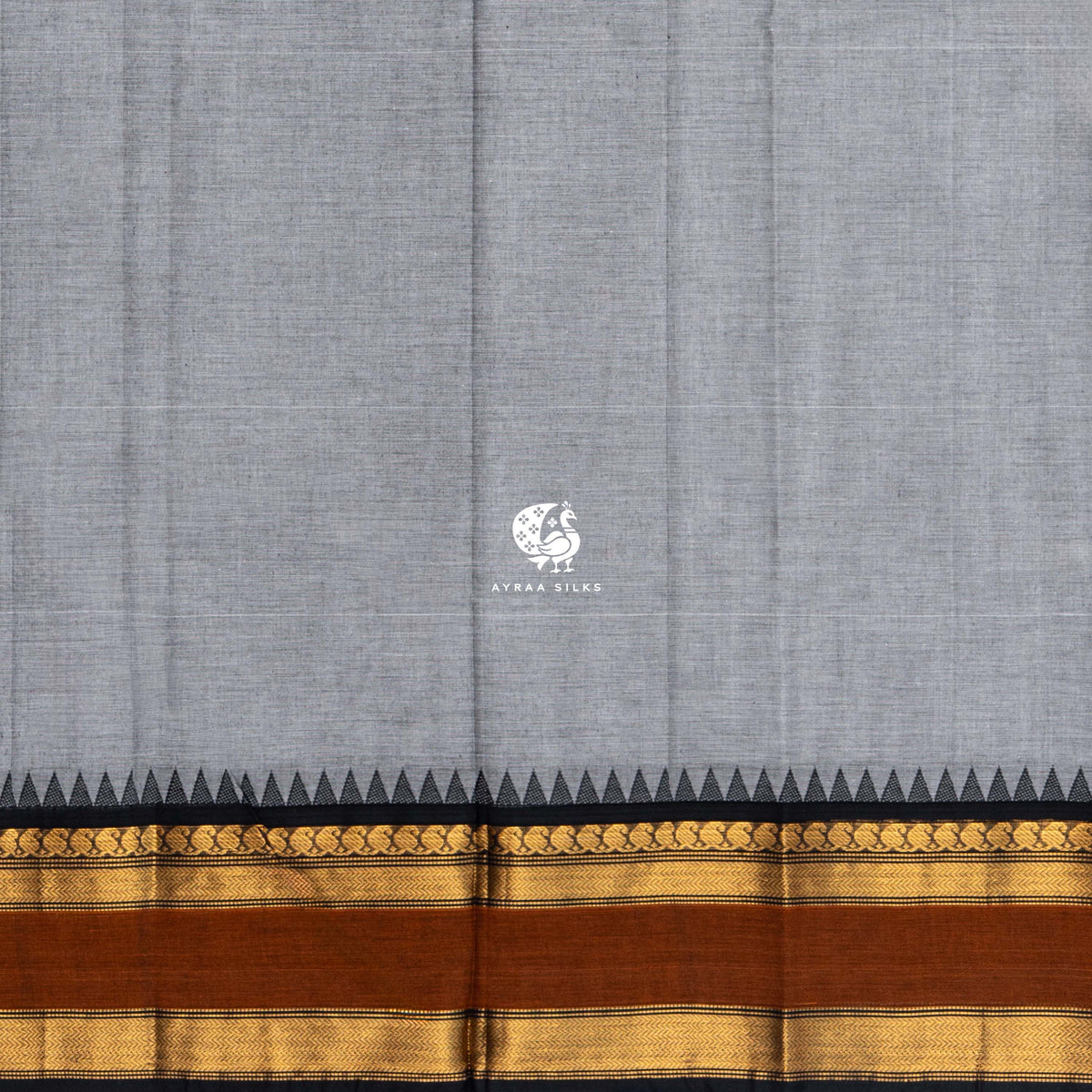 Running blouse of the grey Kanchi cotton saree, same body colour with the rust and black zari border