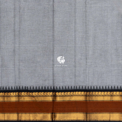 Running blouse of the grey Kanchi cotton saree, same body colour with the rust and black zari border