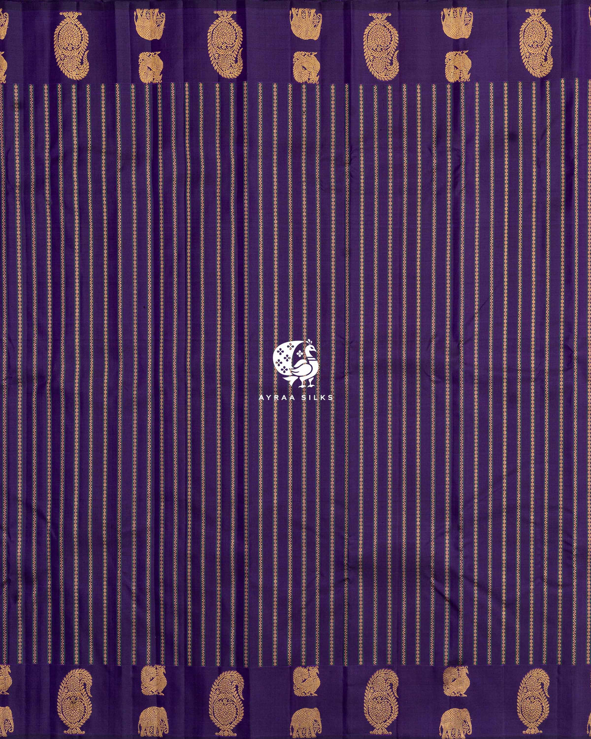Full body view of purple Kanchipuram silk saree with zari stripes and manga, elephant and peacock zari buttas along both borders