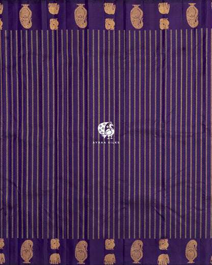 Full body view of purple Kanchipuram silk saree with zari stripes and manga, elephant and peacock zari buttas along both borders