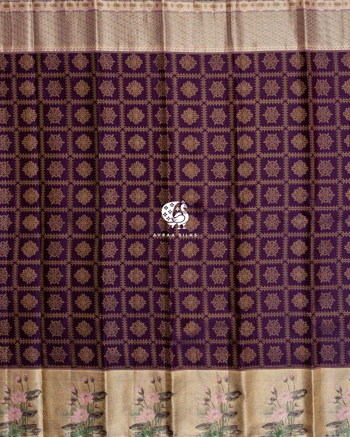 Full body view of jamun purple Kanchipuram silk saree with zari kolam motifs, gold lotus border and pastel floral border