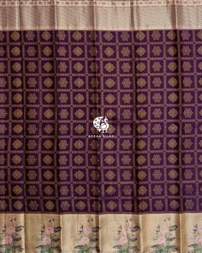 Full body view of jamun purple Kanchipuram silk saree with zari kolam motifs, gold lotus border and pastel floral border