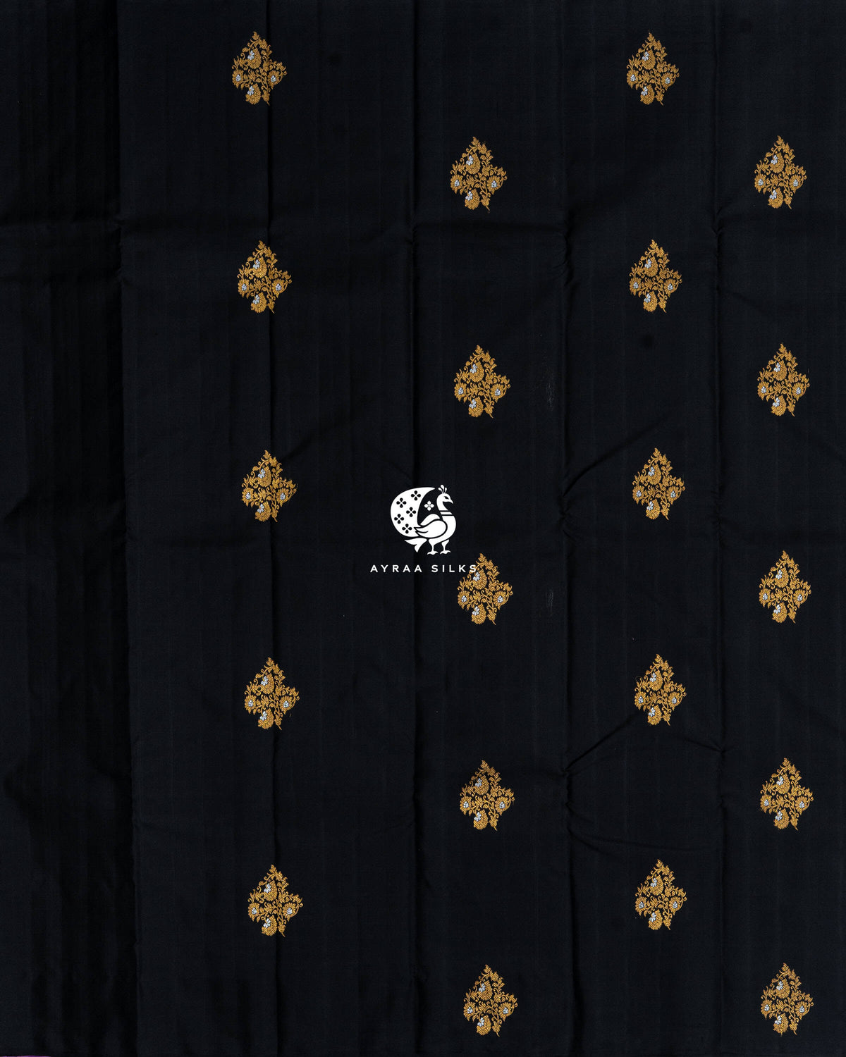 Full body view of the black Kanchipuram silk saree with rows of gold and silver zari floral buttas
