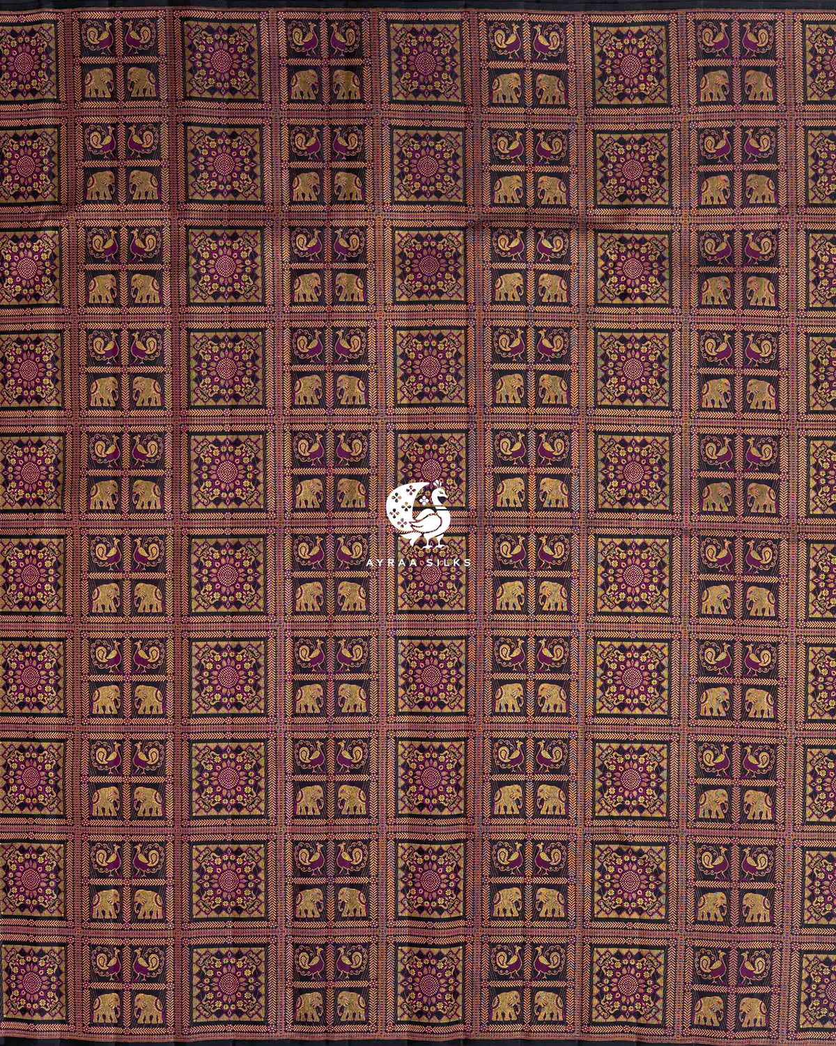 Full body view of the black Kanchipuram silk saree with Kattam (checks) of elephants, peacocks and floral medallions in zari