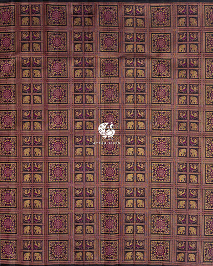 Full body view of the black Kanchipuram silk saree with Kattam (checks) of elephants, peacocks and floral medallions in zari