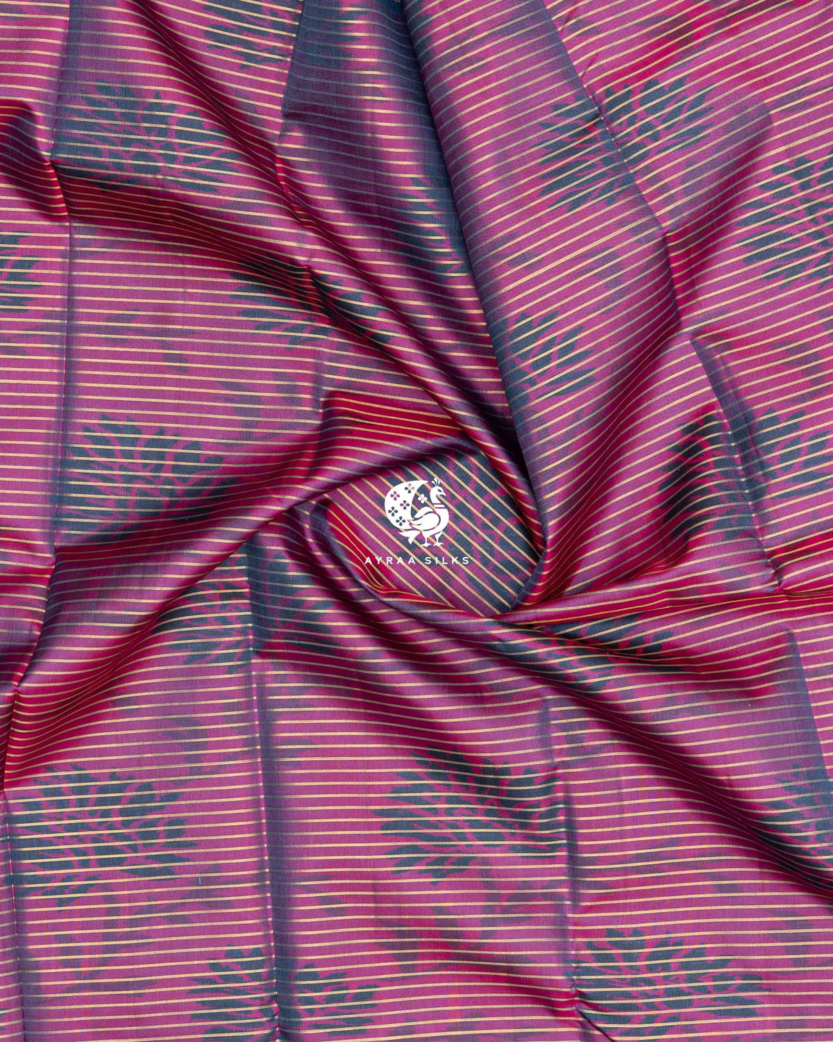 Swirled magenta ikat silk showing its red shot and zari stripes, Magenta and Slate Blue Ikat Ginkgo Moon Kanchipuram silk saree, Ayraa Silks
