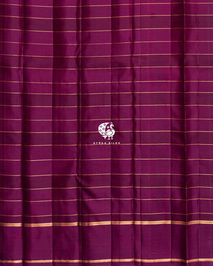 Close view of the running blouse in plain wine silk with fine zari lines