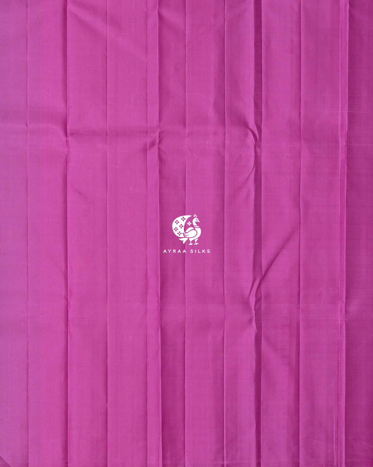 Close view of the running blouse in plain orchid pink silk