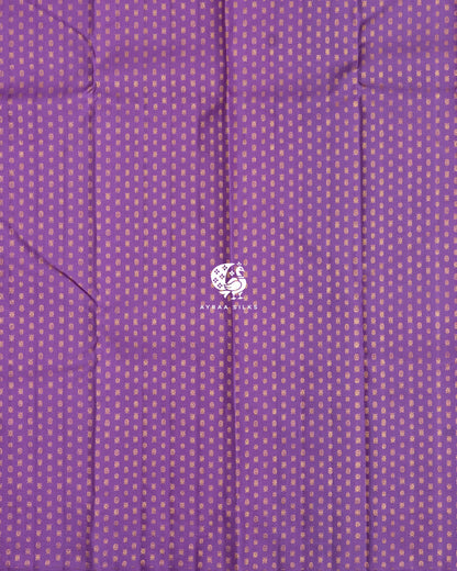 Close view of the running blouse in lavender pure Kanchipuram silk with small zari buttas