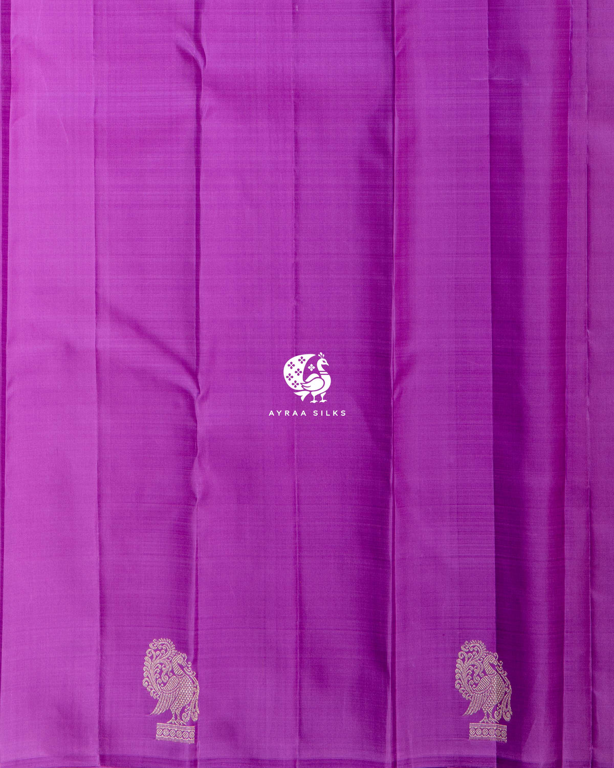 Close view of the running blouse in purple pure Kanchipuram silk with silver zari Annam buttas