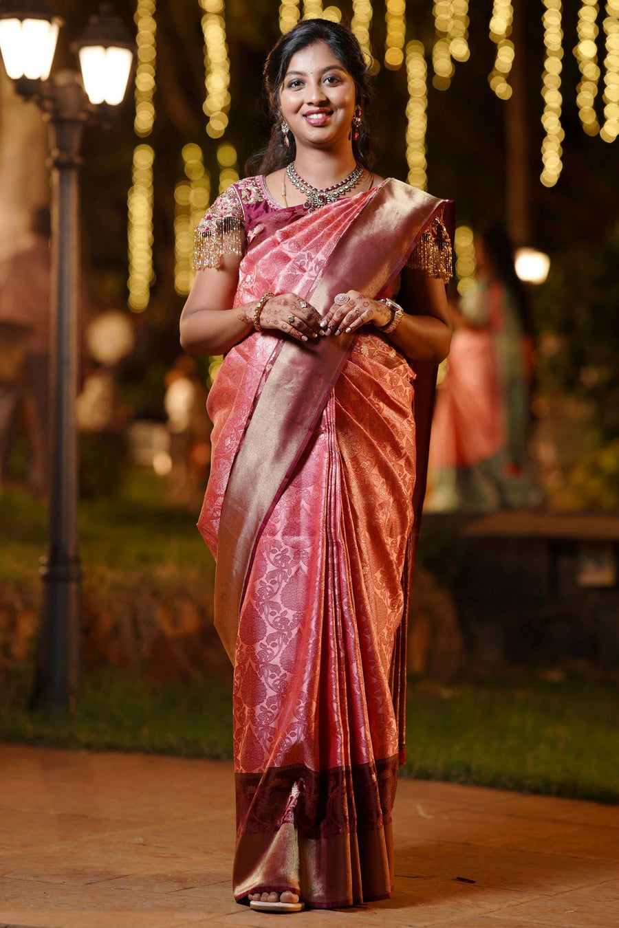 Woman wearing an Ayraa Silks saree