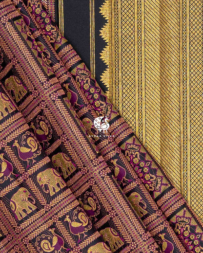 Black and purple brocade pleats beside the temple edge of the gold zari pallu
