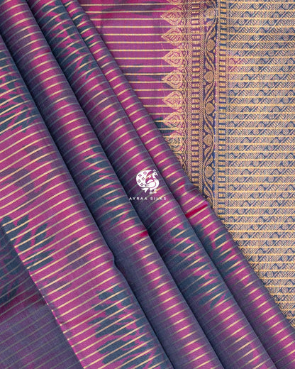 Close view of the pleats and the kovil (temple) edge where the zari pallu meets the magenta ikat body, Magenta and Slate Blue Ikat Ginkgo Moon Kanchipuram silk saree, Ayraa Silks