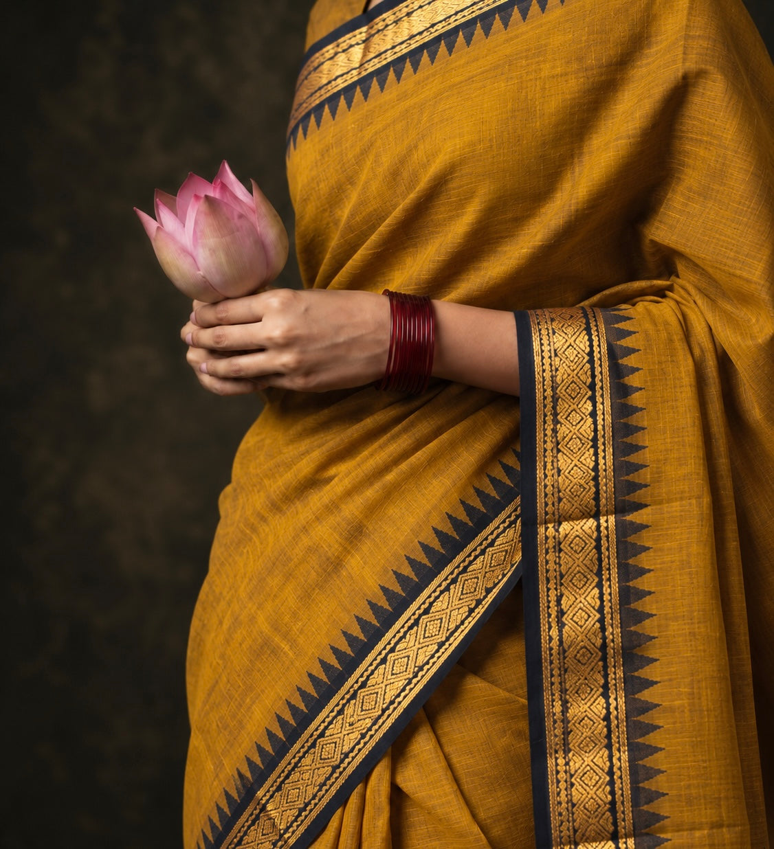 Mustard temple border Kanchi cotton saree draped, black and gold zari border — handwoven pure cotton by Ayraa Silks
