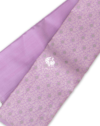 Lilac Statement Kanchipuram silk saree in lilac with mint green and purple, mint green floral zari jaal on the lower drape — pure silk with pure zari, Ayraa Silks
