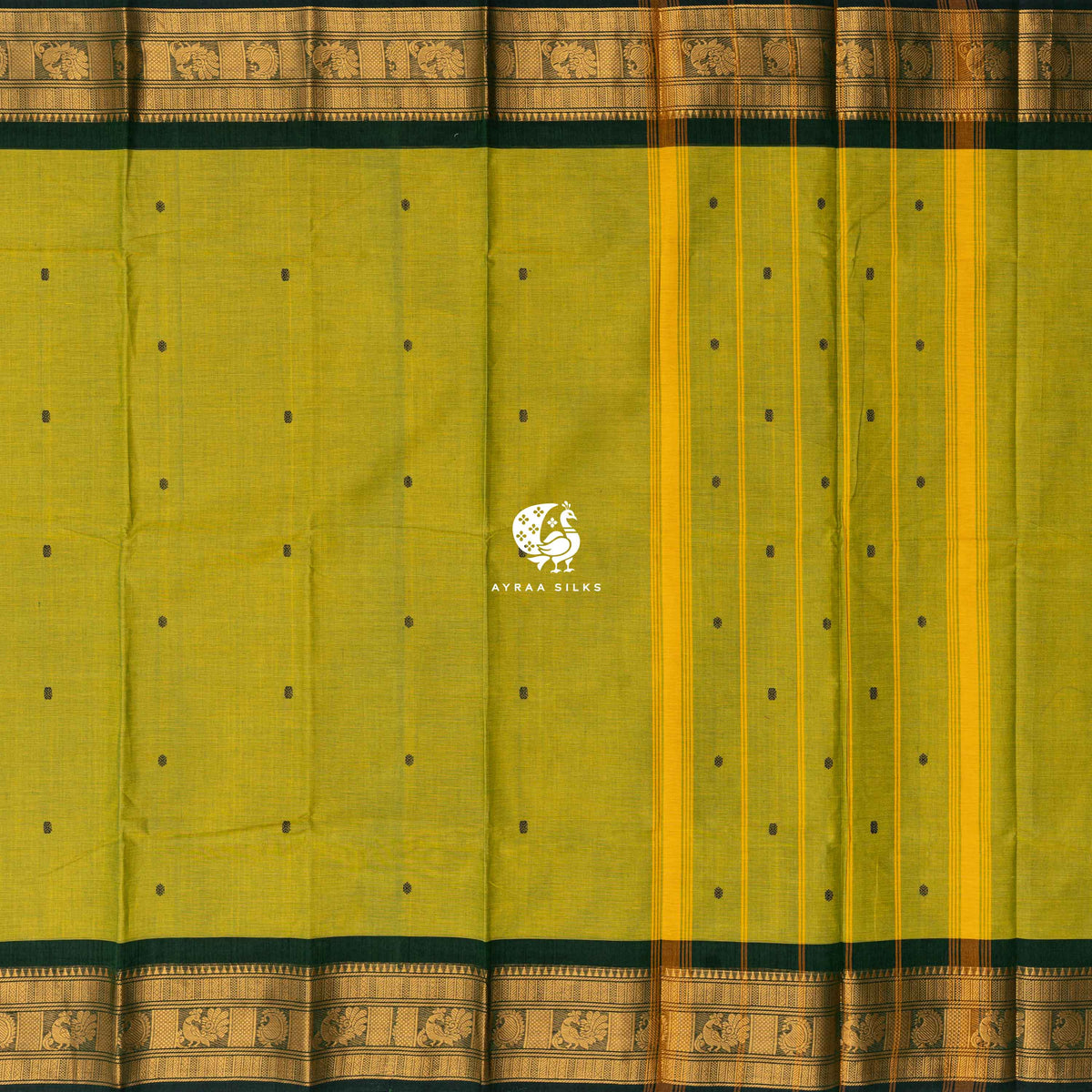Mehendi green Kanchi cotton saree laid flat, pallu with zari lines, bottle green buttas and border