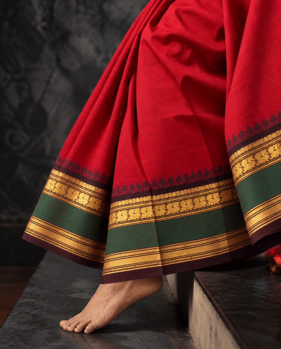 Red Kanchi cotton saree with black temple border, gold zari paisleys and green band — handwoven pure cotton by Ayraa Silks