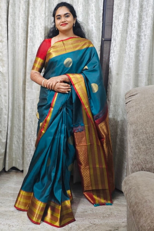 Woman wearing an Ayraa Silks saree